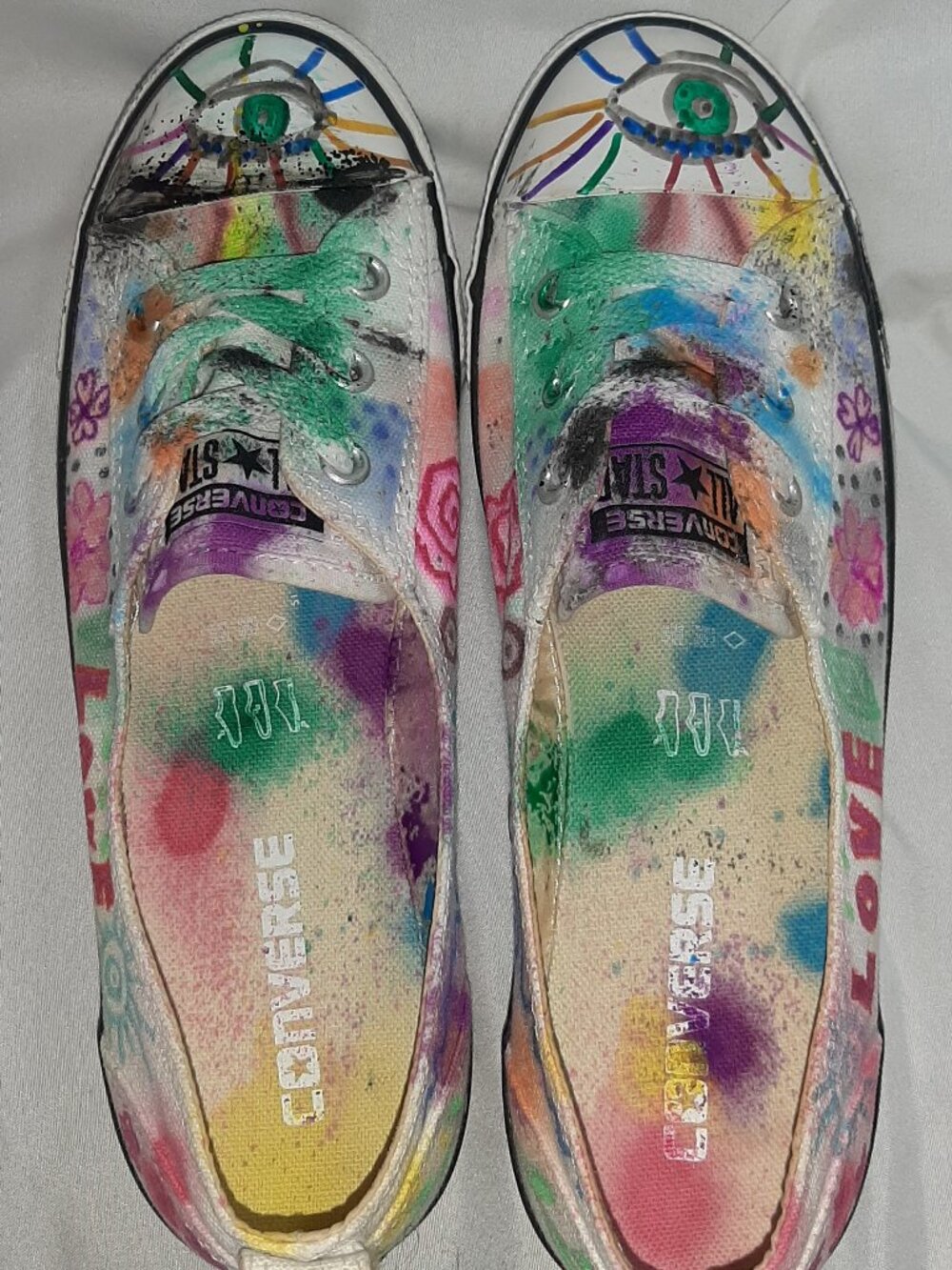 Converse All Star low rise shoes decorated with fabric paints and acrylic marker